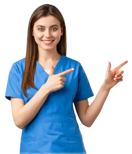 Female healthcare professional wearing blue scrubs smiling while pointing to the right, medical staff in clinical uniform